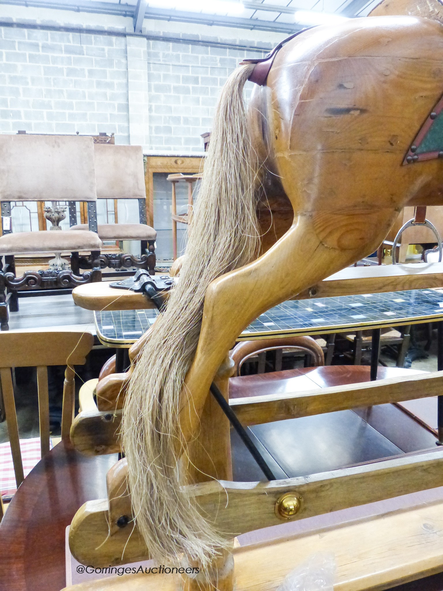 An Edwardian Lines Bros. pine rocking horse, length 144cm, height 126cm